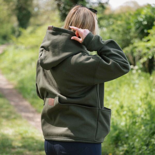 Dog & Field Handler Hoodie worn outdoors showing rear pocket